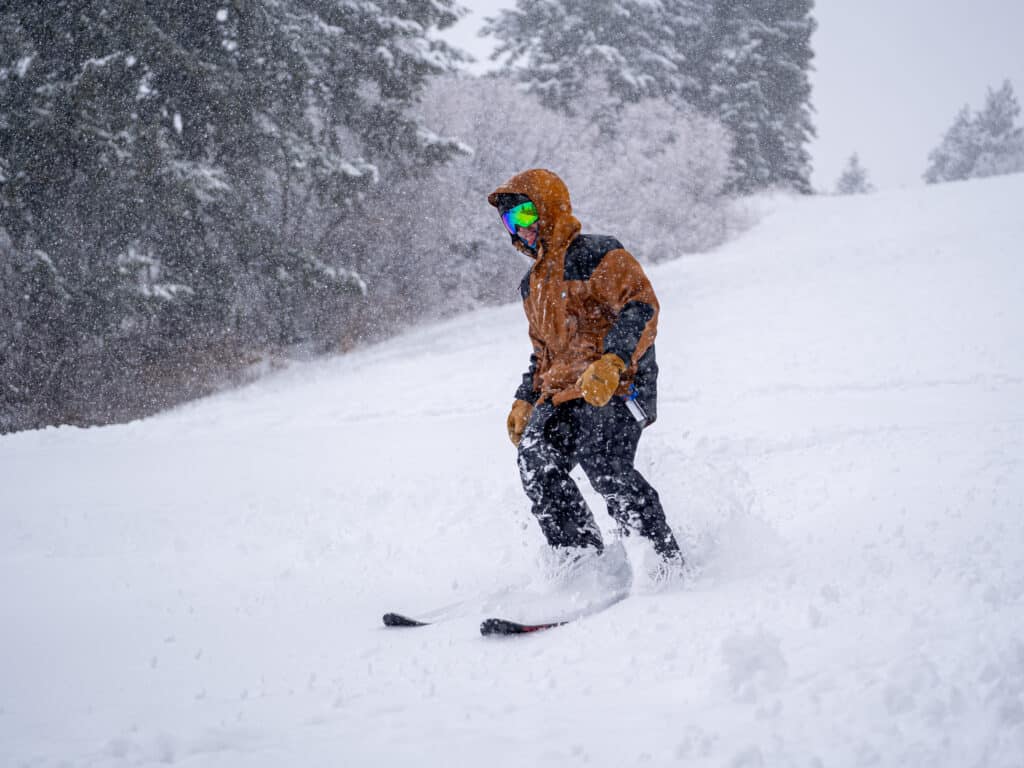 Skier in deep snow at Nordic Valley Ski Resort