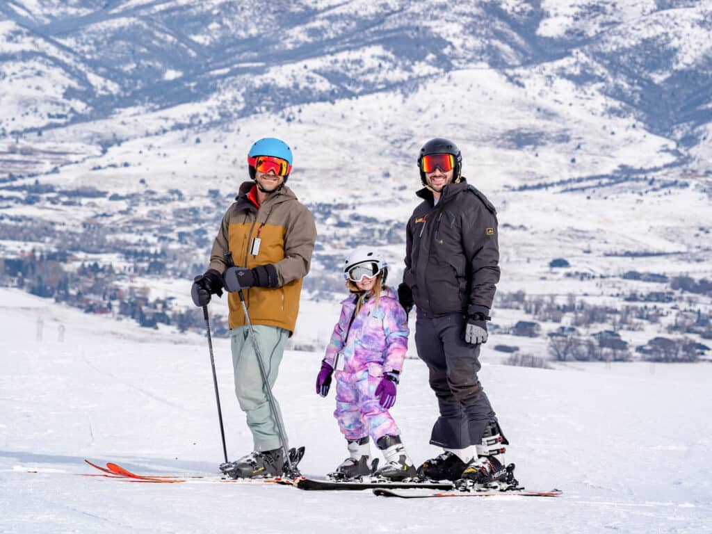 A family of three at Nordic Valley Ski Resort